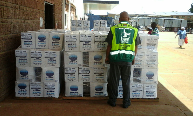 The foundation distributed 5L water bottles in addition to filling buckets and containers brought by the communities