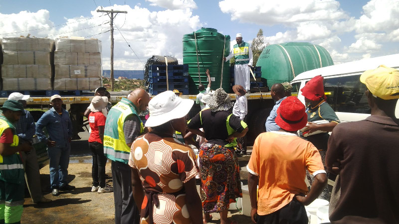 Some of the tanks that were used to fill water vessels brought in by the community