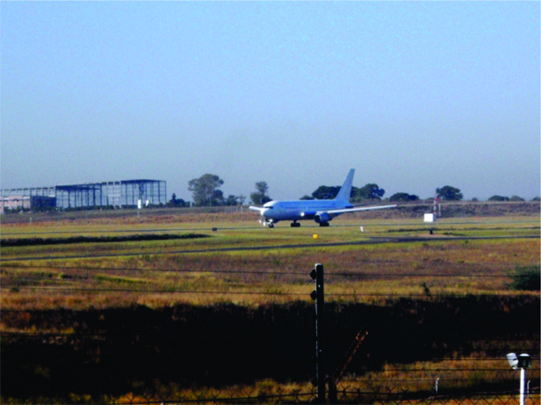 The humanitarian flight sponsored by government taxis down the runway at the Lanseria Airport, Johannesburg.